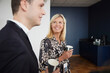 © Johnér - Smiling businesswoman during coffee break