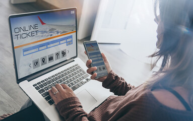 Girl search ticket vacation on laptop. Woman booking flight. Plan travel and book holidays online