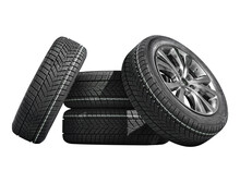 Car Tires With A Great Profile In The Car Repair Shop.  Set Of Summer Or Winter Tyres In Front Of White Fond. On Transparent PNG Background.