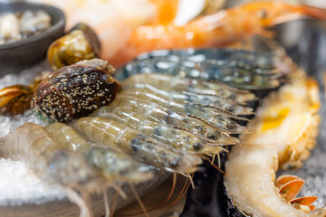 Canvas Print - Bowl of seafood for hotpot in restaurant