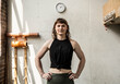 © Caia Image - Portrait confident young woman exercising in gym