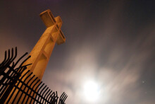 The cross on top of Mount Soledad is illuminated at night in La Jolla, CA.