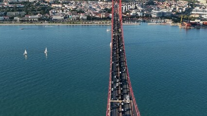 Sticker - The 25 April bridge (Ponte 25 de Abril) located in Lisbon, Portugal, crossing the Targus river. Drone. 4k