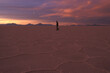 © Cavan Images - Salt flat hiker, sunset
