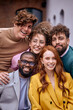 © Roman - Close-up Portrait of Excited Diverse Business People Posing At Camera Outdoors, Cheerfully Smiling, Dressed In Fashionable Elegant Clothes. Friendly Caucasian And Afro American Colleagues