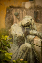 A Draped Statue Adorns The Cemetery In A Church In Portofino, Italy