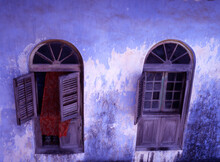 Blue Wall And Windows On A House In Stone Town.