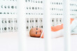 © Cavan Images - View through a crib of a newborn baby girl laying down