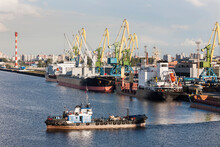 Boat And Cranes At Merchant's Harbor, Saint Petersburg, Russia