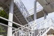© larrui - white metal exterior stairs of a flyover