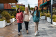 © Manu Prats/Stocksy - Multiracial women shopping in mall