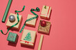 © Marc Tran/Stocksy - Gift boxes, paper's rools and decorations on color background