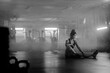 © Albert Law - Young Asian female training in gym with weights at night