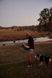 © Alexandrena Parker/Stocksy - Man goes fishing with dog
