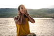 © Luis Herrera/Stocksy - happy woman enjoying nature