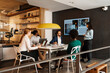 © Aleksandra Jankovic/Stocksy - Pregnant Woman Doing Presentation At Work