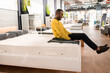 © Hernandez & Sorokina/Stocksy - Man Trying Mattress In The Shop