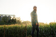 © Berena Alvarez/Stocksy - bearded man in cornfield