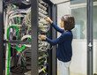 © ACALU Studio/Stocksy - Engineer woman working in a datacenter
