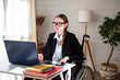 © Anfisa&friends/Stocksy - business woman with disability