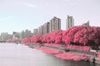 © Heng Yu/Stocksy - Infrared photography of cityscape by river