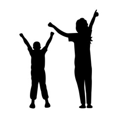 Silhouette of a woman with her son joyfully raising their hands. A happy family