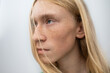 © Vradiy Art/Stocksy - Handsome man with long blond hair