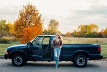 Teen Girl And Blue Truck