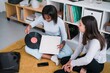 © Studio Marmellata/Stocksy - Happy diverse ladies choosing vinyl records on floor