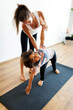 © Valentina Barreto/Stocksy - Children's yoga class
