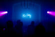 © Mauro Grigollo/Stocksy - Let's Party sign in a club