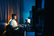 © Pedro Merino/Stocksy - Young man playing video games online on pc