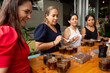 © Ángela Rober/Stocksy - Women learning about Colombian coffee