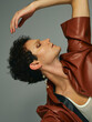 © ohlamour studio/Stocksy - Fashion model wearing ecologic leather jacket