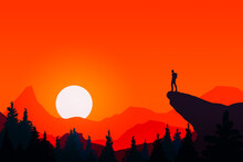 Silhouette Of A Man At Sunset In The Mountains