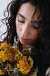 © Sergey Filimonov/Stocksy - Woman Portrait With Flowers