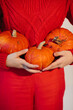 © Sergey Filimonov/Stocksy - Woman with pumpkins