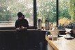 © Uladzimir Metlitski/Stocksy - Cafe teller, autumn vibe.