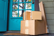 © jamie grill atlas/Stocksy - Stack of Purchases Delivered to Your Doorstep