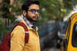 © Dream Lover/Stocksy - Portrait of an Indian man wearing yellow colored jeans jacket