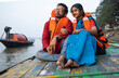 © Dream Lover/Stocksy - Young Couple Enjoying Travel Sitting On A Boat Over River Ganga,India