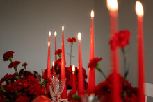 Red Burning Candles On The Christmas Table