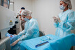 © AD Astra Team/Stocksy - The surgeon performs an eye operation