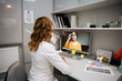 © AD Astra Team/Stocksy - Doctor talks to patient via video call