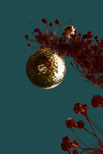 Goldes Sphere And Red Flowers