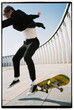 © Alexander Kalinin/Stocksy - businessman on a skateboard in the city