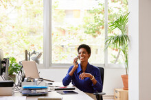 African American Woman Having Phone Call
