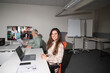 © Hernandez & Sorokina/Stocksy - Candid Image Of Work At Office