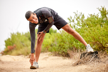 Canvas Print - Stretching legs, exercise and man on nature trail for running, marathon training and cardio workout. Sports, healthy body and portrait of happy male athlete warm up for wellness, exercise and balance