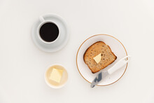 Food: Breakfast With Toasts, Butter And Coffee